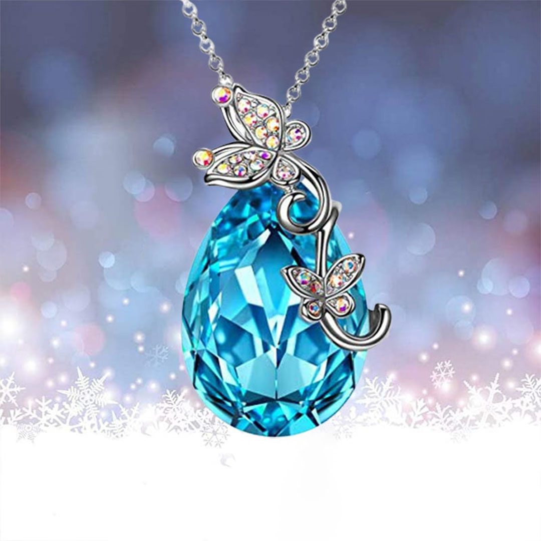 قلادة بشكل فراشة مرصعة بكريستال ازرق